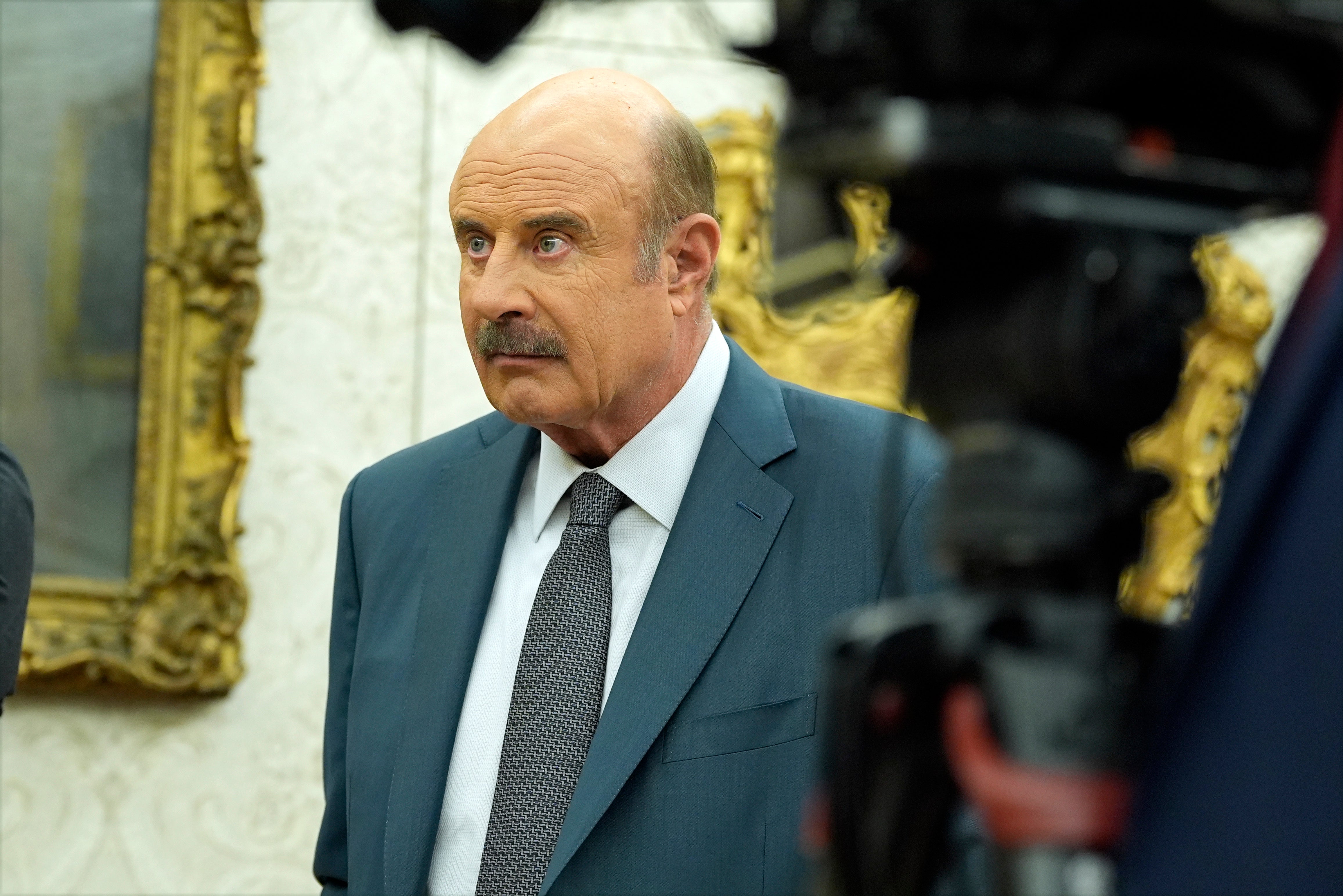 Dr Phil and a television crew were embedded with ICE agents when raids took place on Friday