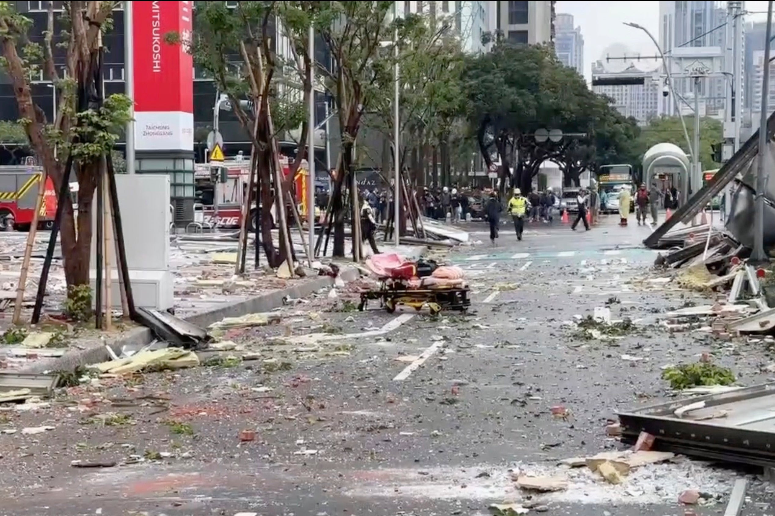 The debris are strewn across the streets in the aftermath of an explosion at the Shin Kong Mitsukoshi department store in Taichung city in Taiwan