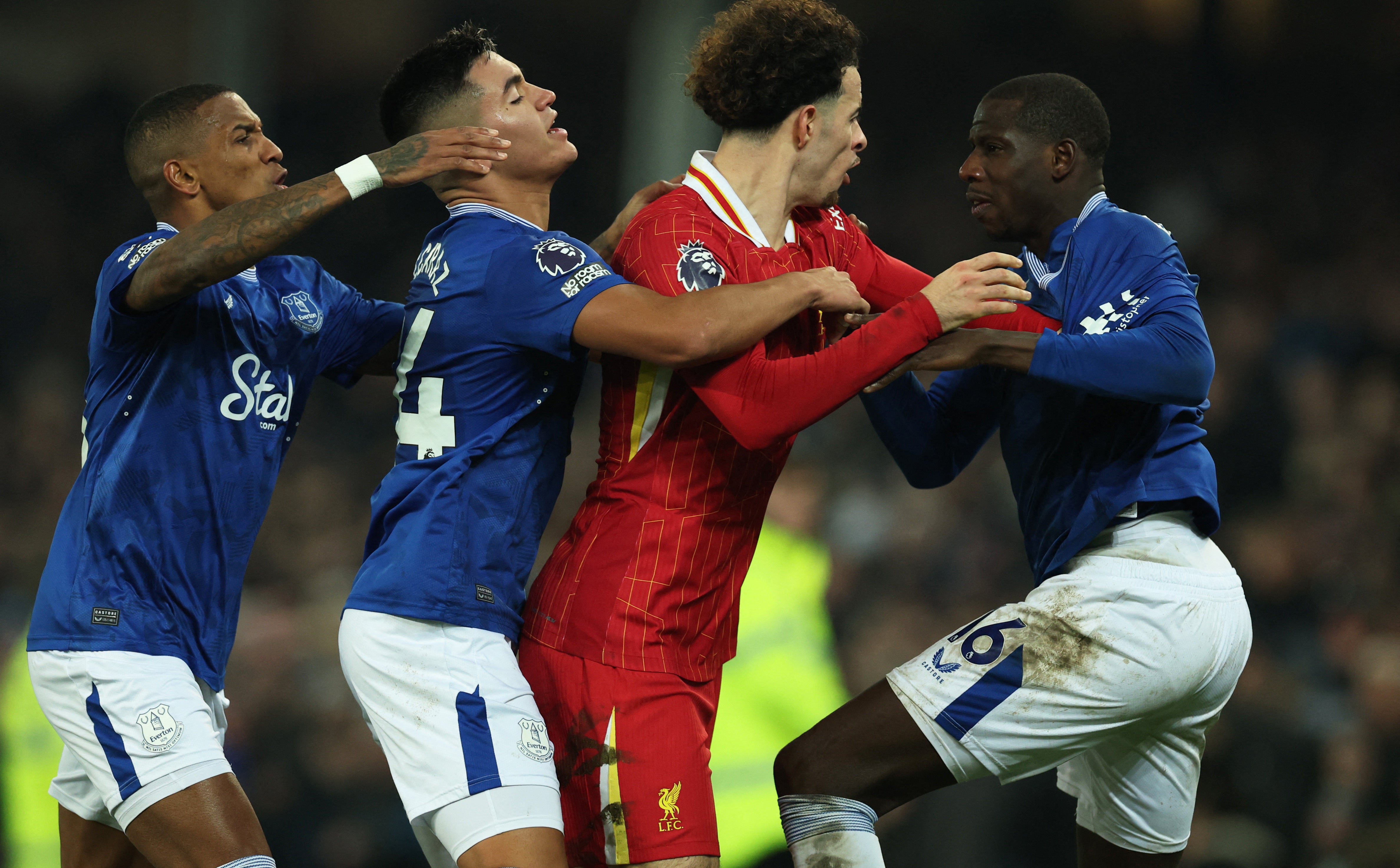 Curtis Jones clashes with Abdoulaye Doucoure after the final whistle