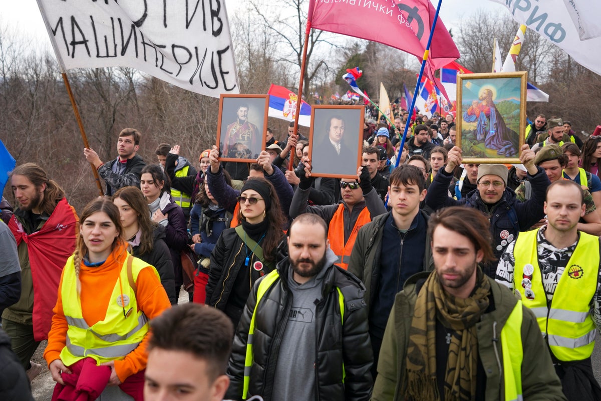 Marching university students in Serbia receive warm welcome on their way to big rally this weekend