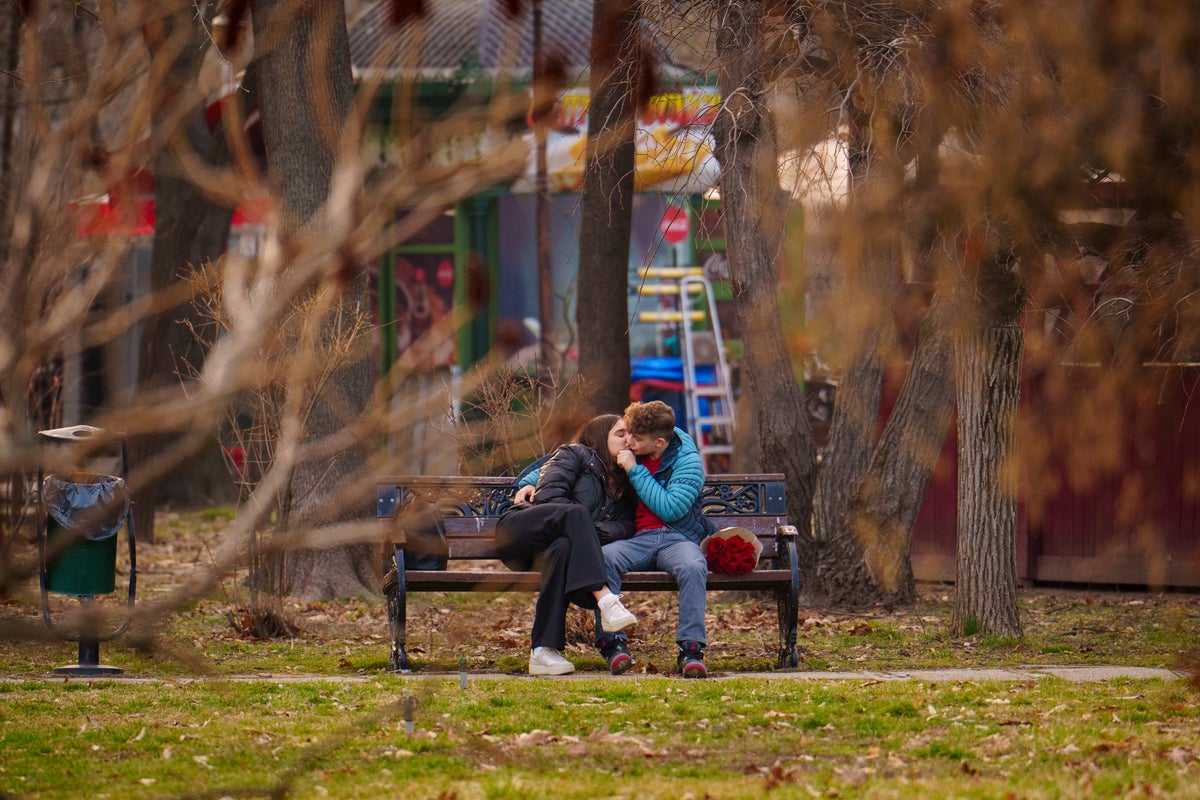 From roses in Vietnam to engraved 'love locks' in Germany, the world celebrates Valentine's Day