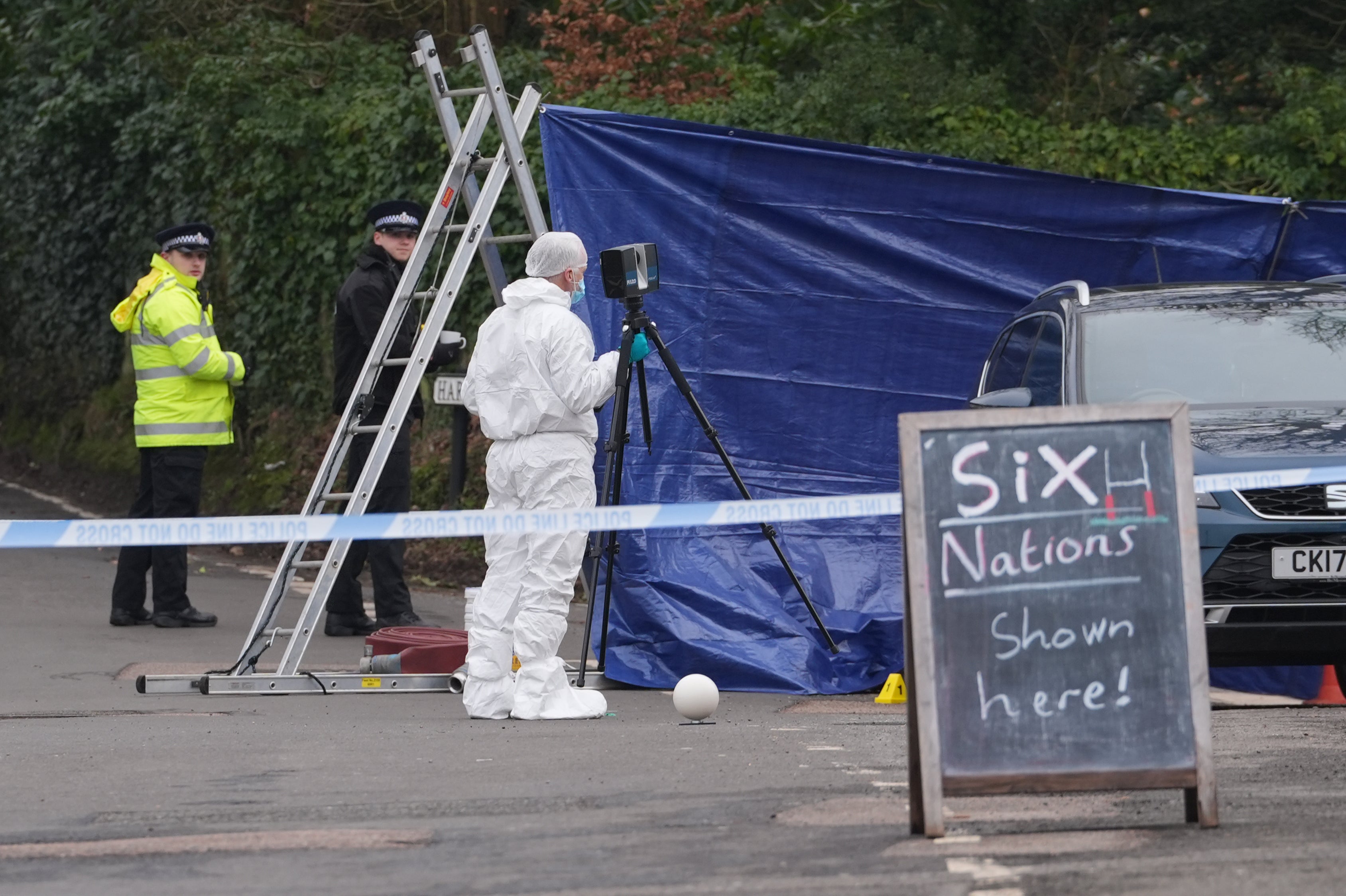 Forensic officers are scouring the scene