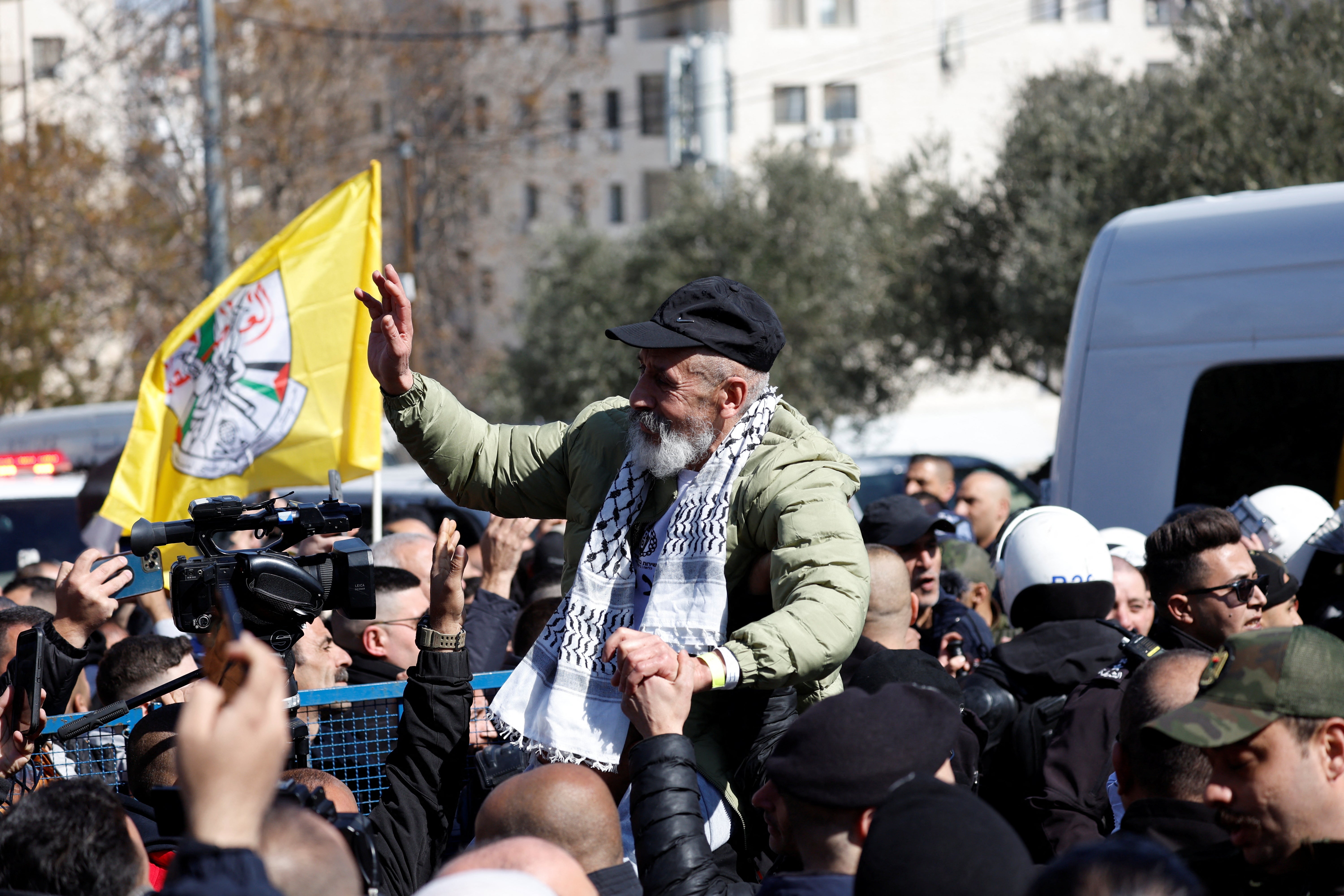 A freed Palestinian prisoner is greeted after being released from an Israeli jail