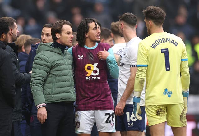 <p>Hannibal Mejbri of Burnley looks to speak to referee Andrew Hughes </p>