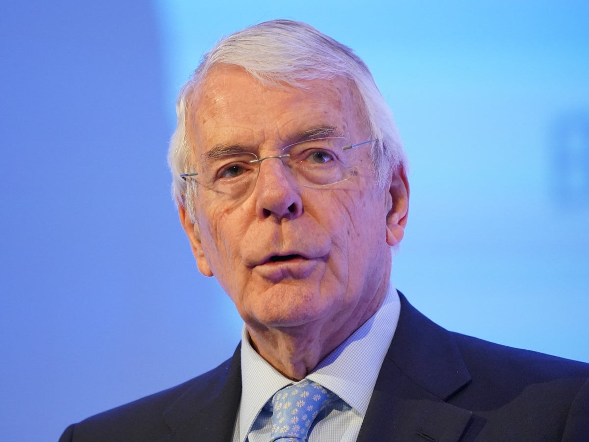 John Major accuses Donald Trump of ‘cuddling’ up to Vladimir Putin