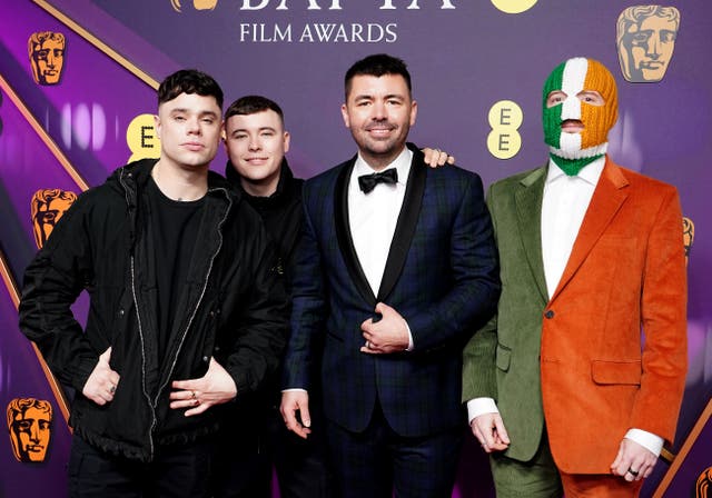 <p>Mo Chara (Naoise O Caireallain), Moglai Bap (Liam Og O Hannaidh), Rich Peppiatt and DJ Provai of Kneecap attending the 78th British Academy Film Awards, at the Royal Festival Hall, Southbank Centre, London (Ian West/PA)</p>
