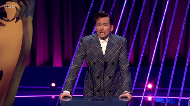 <p>David Tennant on stage at the 2025 Baftas</p>