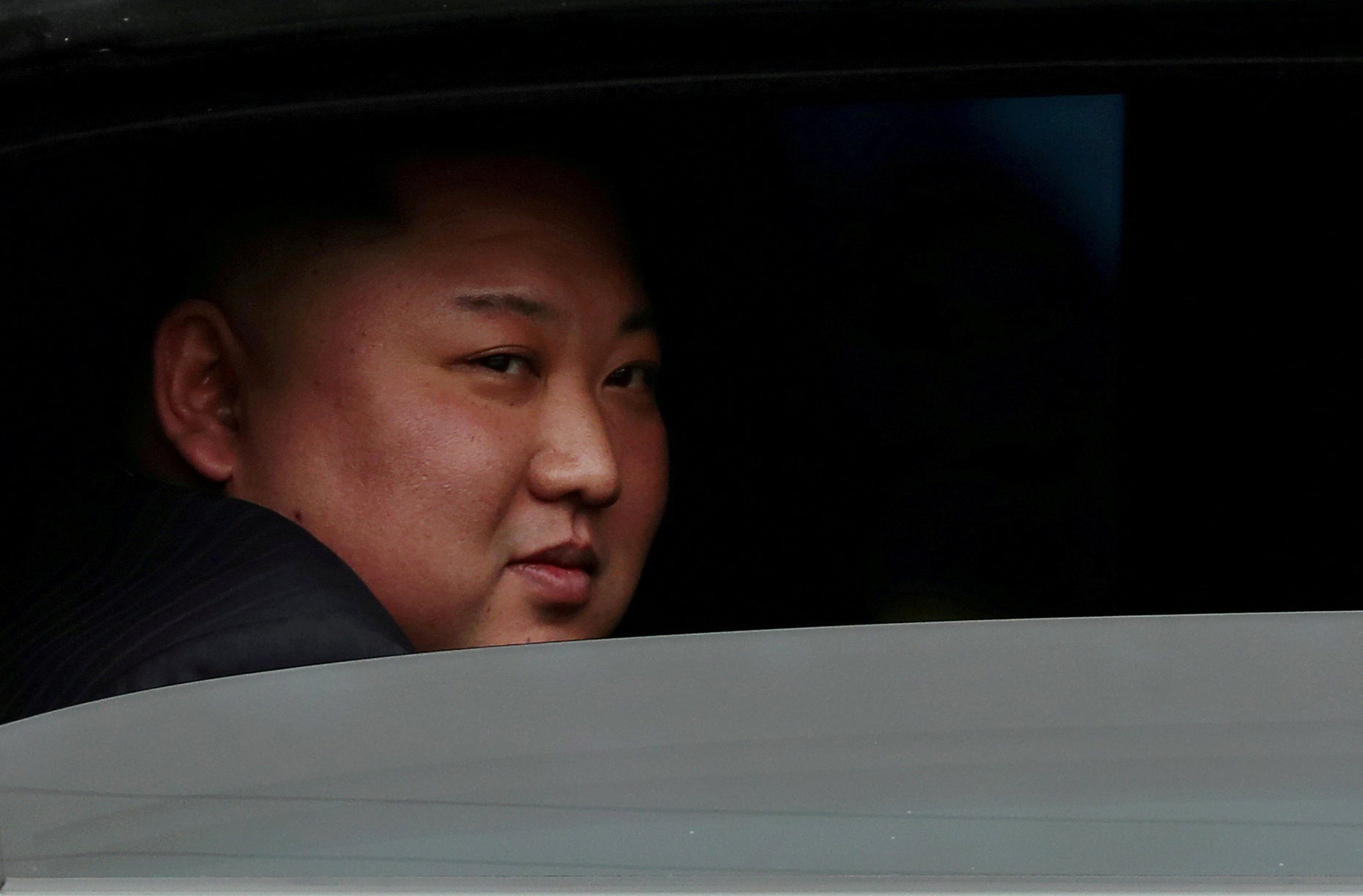 North Korea's leader Kim Jong Un sits in his vehicle after arriving at a railway station in Dong Dang, Vietnam, at the border with China, February 26, 2019
