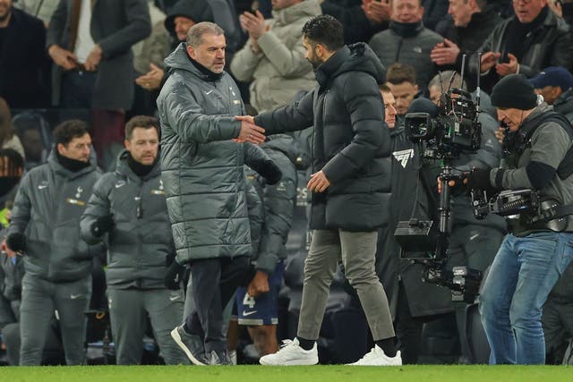 Tottenham boss Ange Postecoglou (left) shakes hands with Manchester United’s head coach Ruben Amorim (AP Photo/Ian Walton/PA)