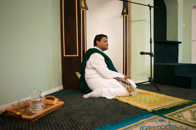 <p>Muhsin Hendricks prepares to lead a prayer</p>