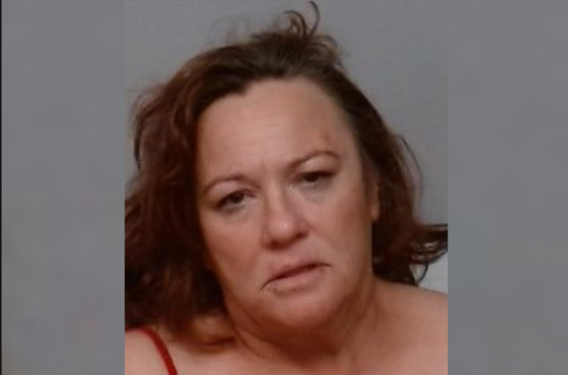 <p>Melanie Davis, 47, was arrested after attacking a man with a garden hoe and other tools after he stood her up, police say</p>