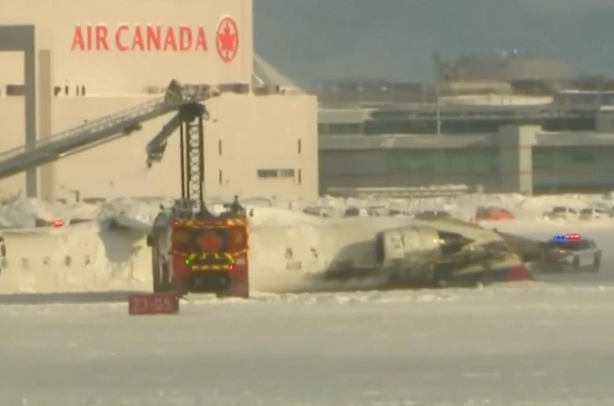 Toronto plane crash live Delta flight flips over at airport leaving 18