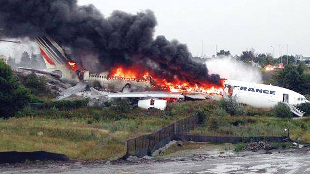 Stricken Airbus A340 at Toronto as fire takes hold