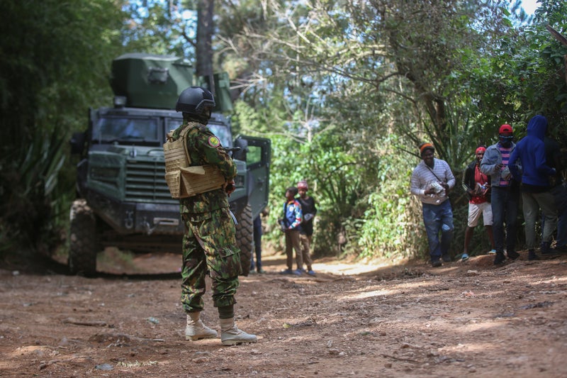 A police union in Haiti demands more protection a day after gangs kill a Kenyan policeman