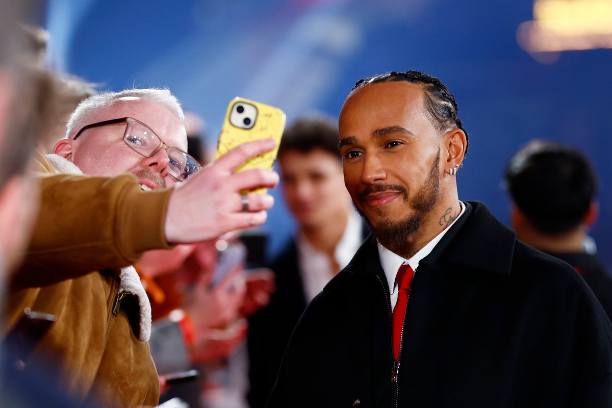 F1 75 LIVE: Reaction as Lewis Hamilton speaks in Ferrari red and Christian Horner jeered at event in London