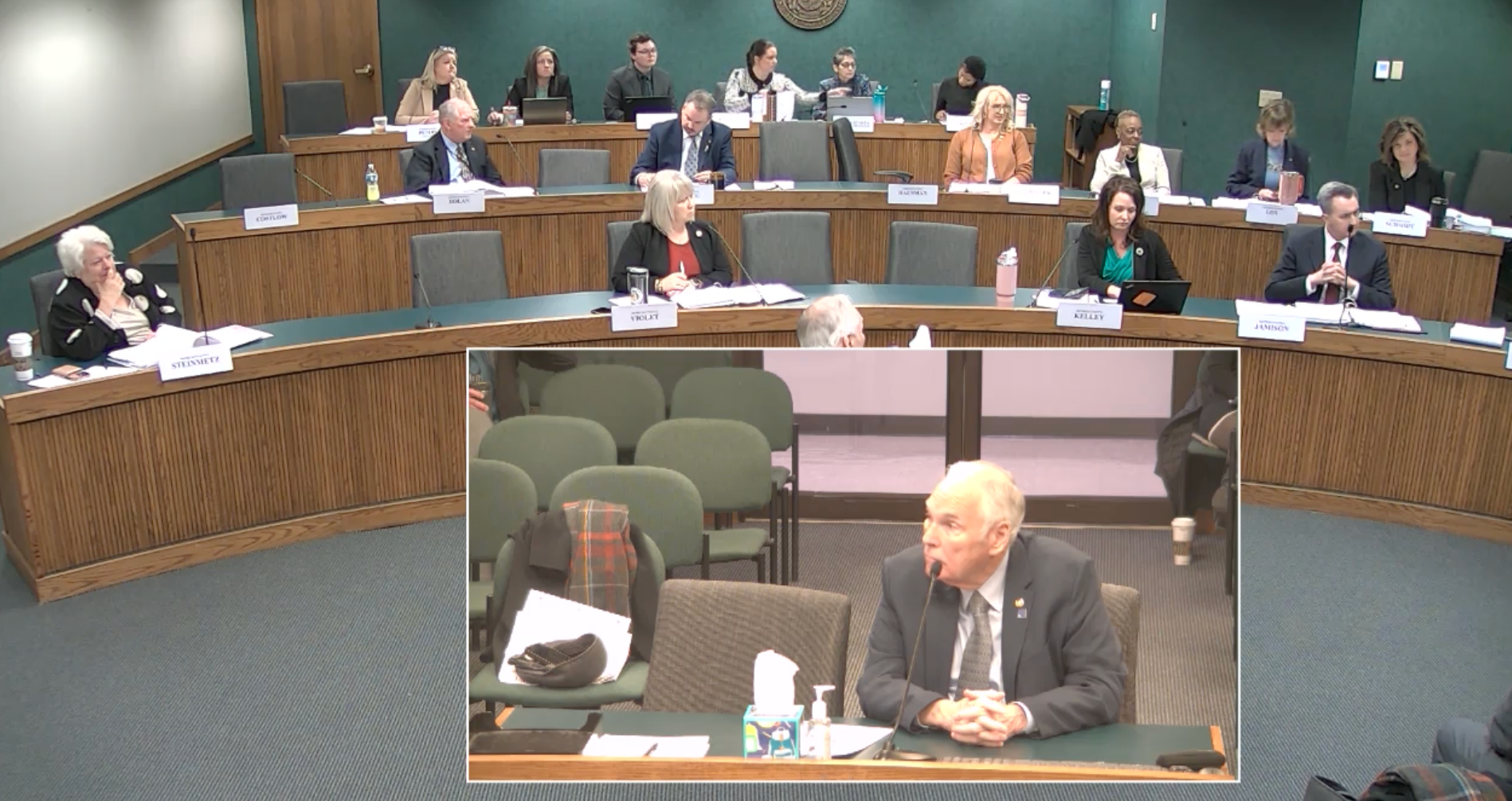 Missouri state Rep. Phil Amato, seated, introduces legislation to create a database of pregnant women ‘at risk’ of seeking abortion at the Missouri House of Representatives Children and Families Committee February 18