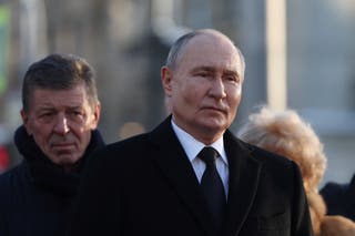 Putin takes part in a flower laying ceremony at the monument to the first mayor of Saint Petersburg, Anatoly Sobchak, on Wednesday