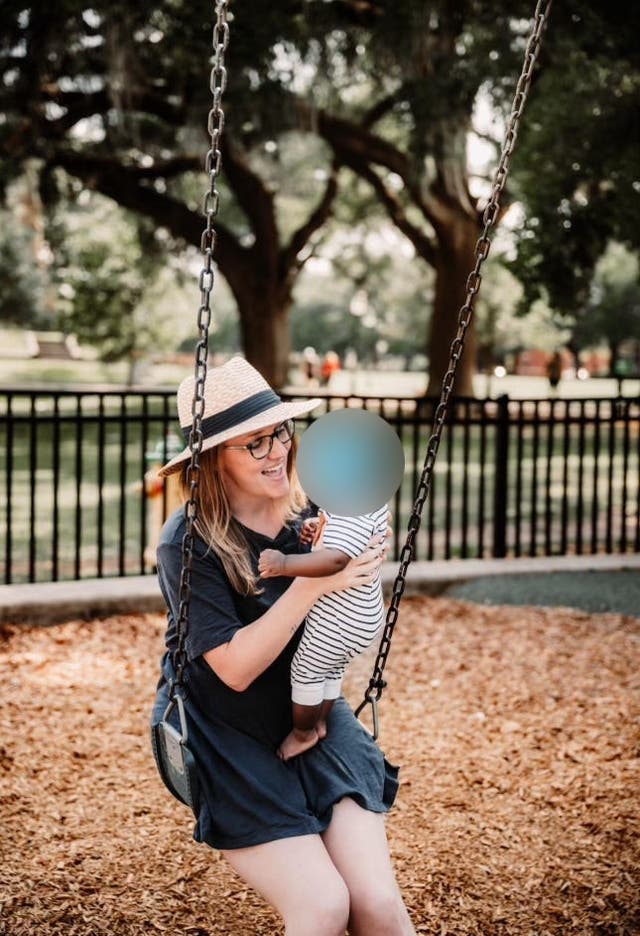 <p>Krystena Murray with the baby she was forced to give up five months after he was born. The baby was not from her embryos and now she is suing her IVF clinic</p>