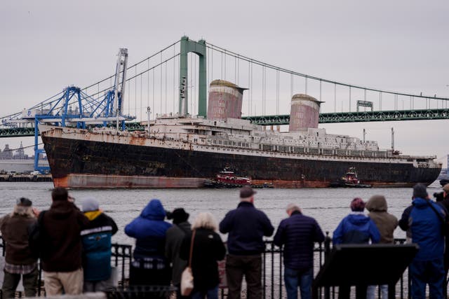 <p>The SS United States was towed down the Delaware River between Pennsylvania and New Jersey in February</p>