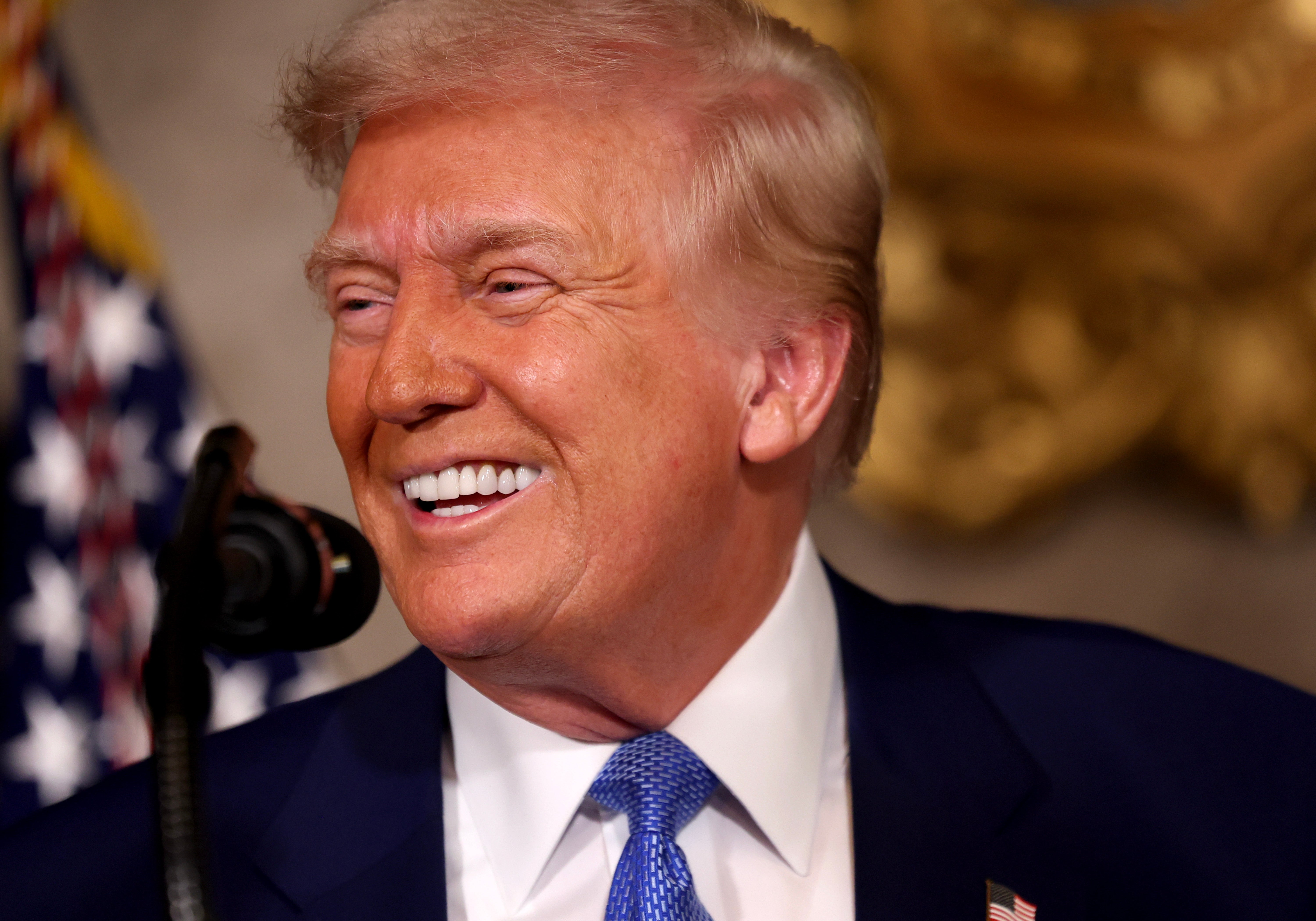 President Donald Trump delivers remarks after signing an executive order on expanding access to IVF at his Mar-a-Lago resort