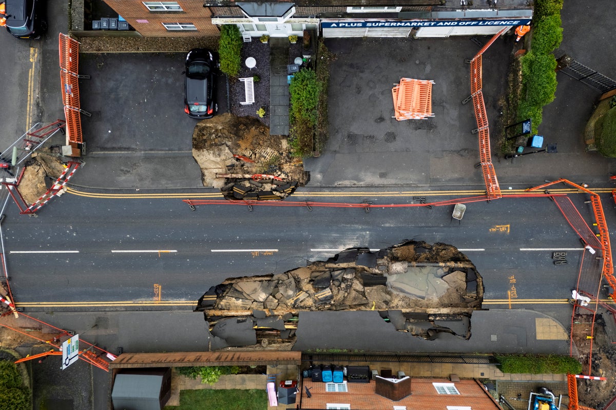 Surrey Grandfathers Defy Sinkhole, Refuse to Leave Homes