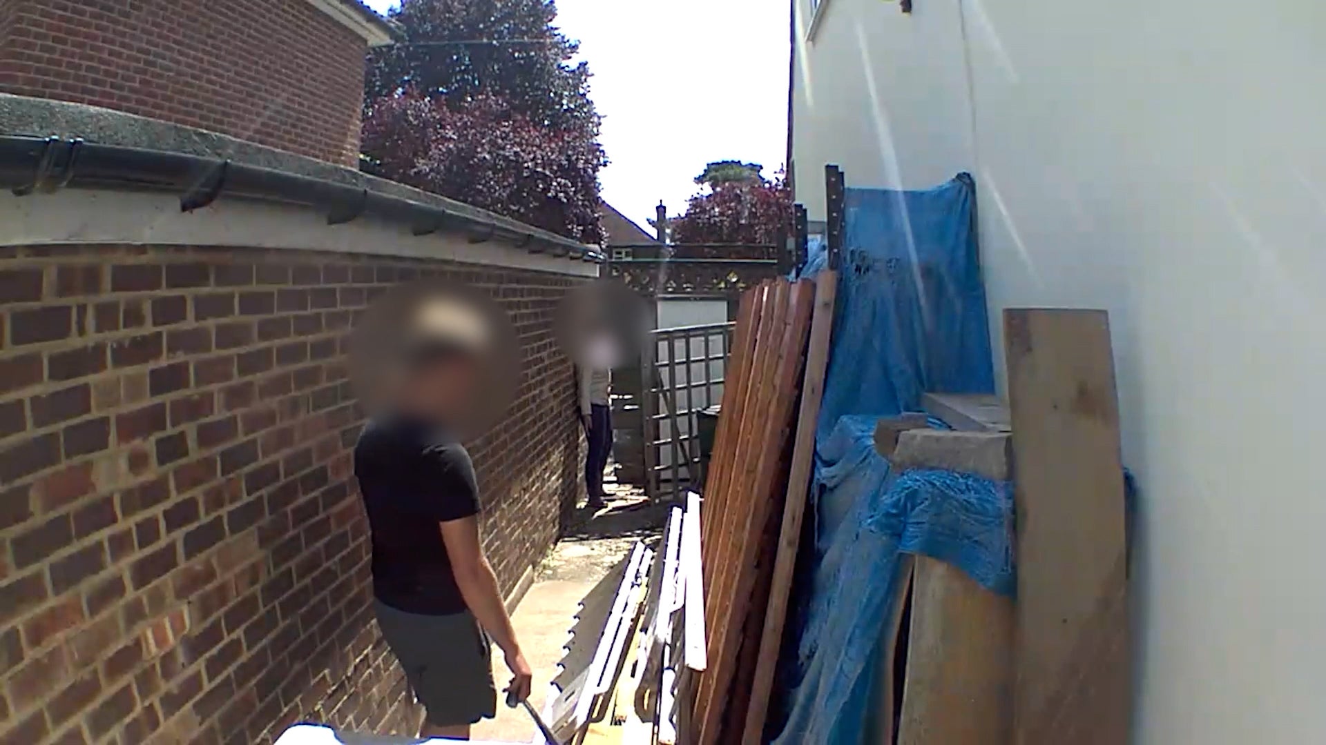 <p>Rosa and Murray Bell, of Tadworth, Surrey, are locked in a dispute with their neighbours over boundary lines</p>