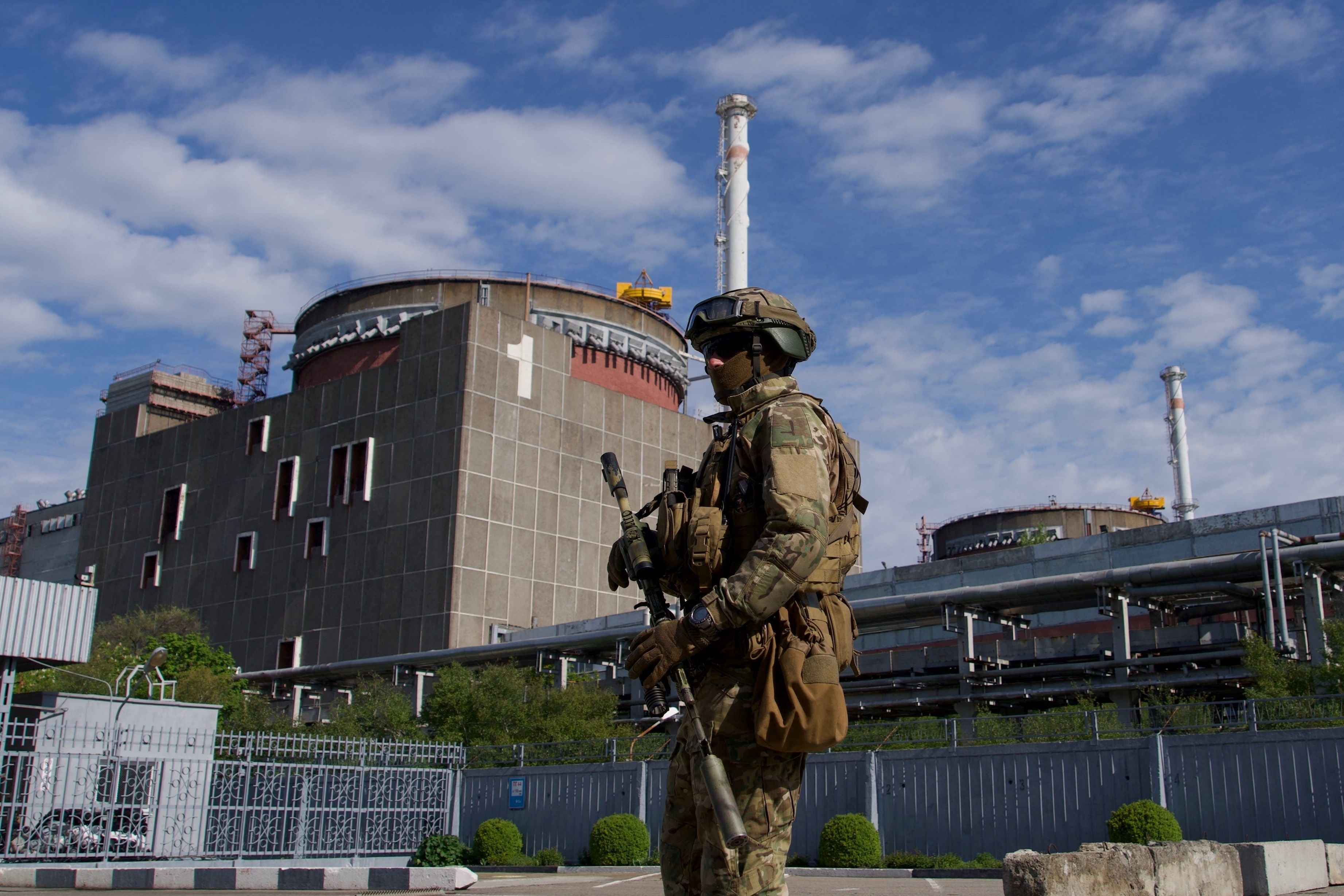 A Russian serviceman patrols the territory of the Zaporizhzhia Nuclear Power Station in May 2022