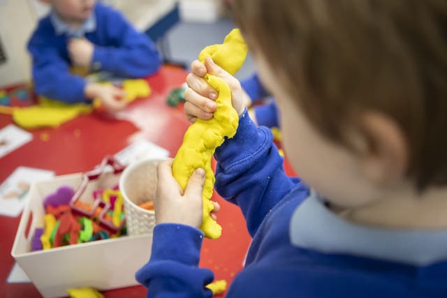 The expansion of funded childcare for working parents began being rolled out in England in April last year (Danny Lawson/PA)