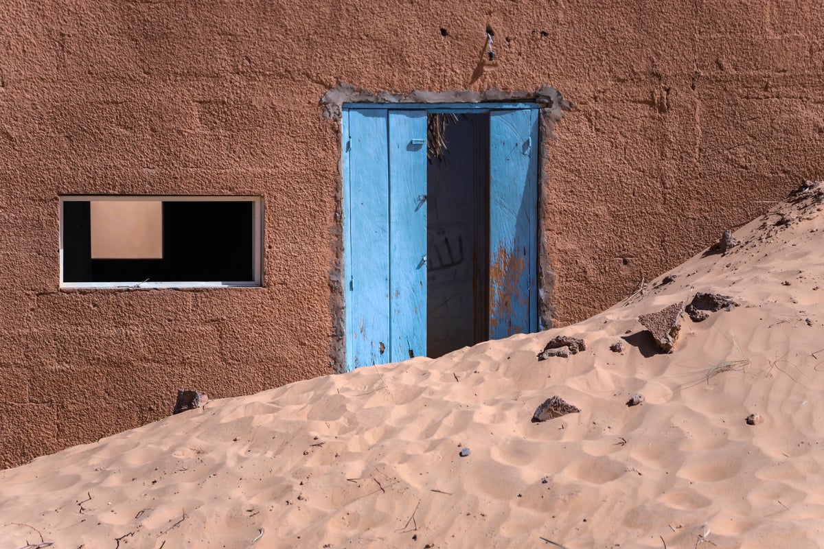 An encroaching desert threatens to swallow homes and history