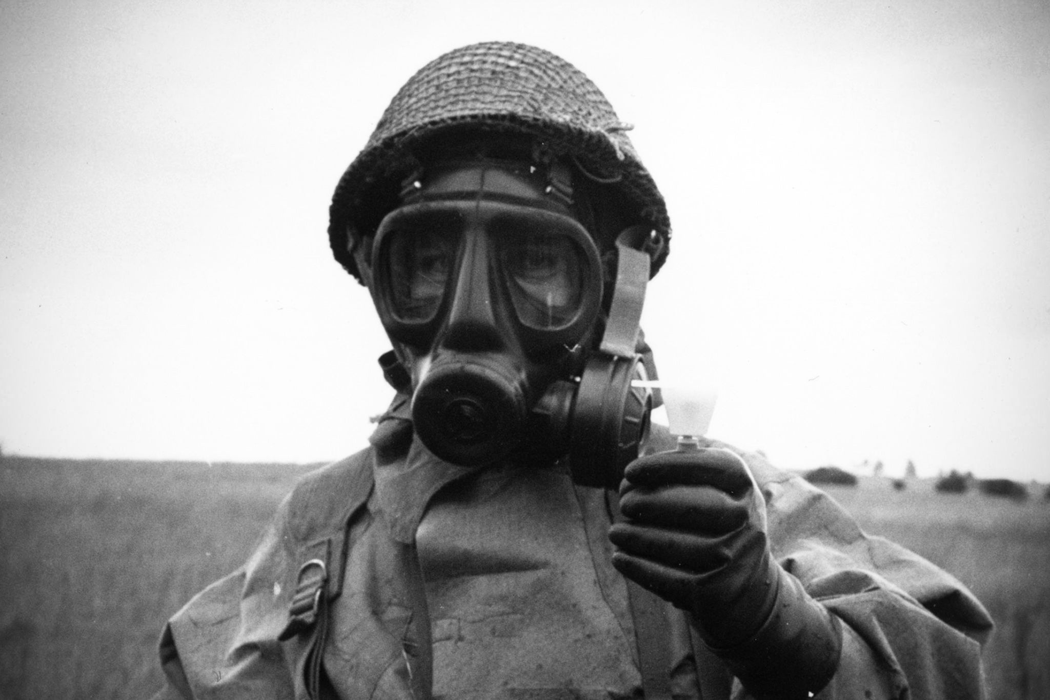 Sergeant of the RAF Regiment wearing protective clothing and using a residual vapour detector at Porton Down in Wiltshire