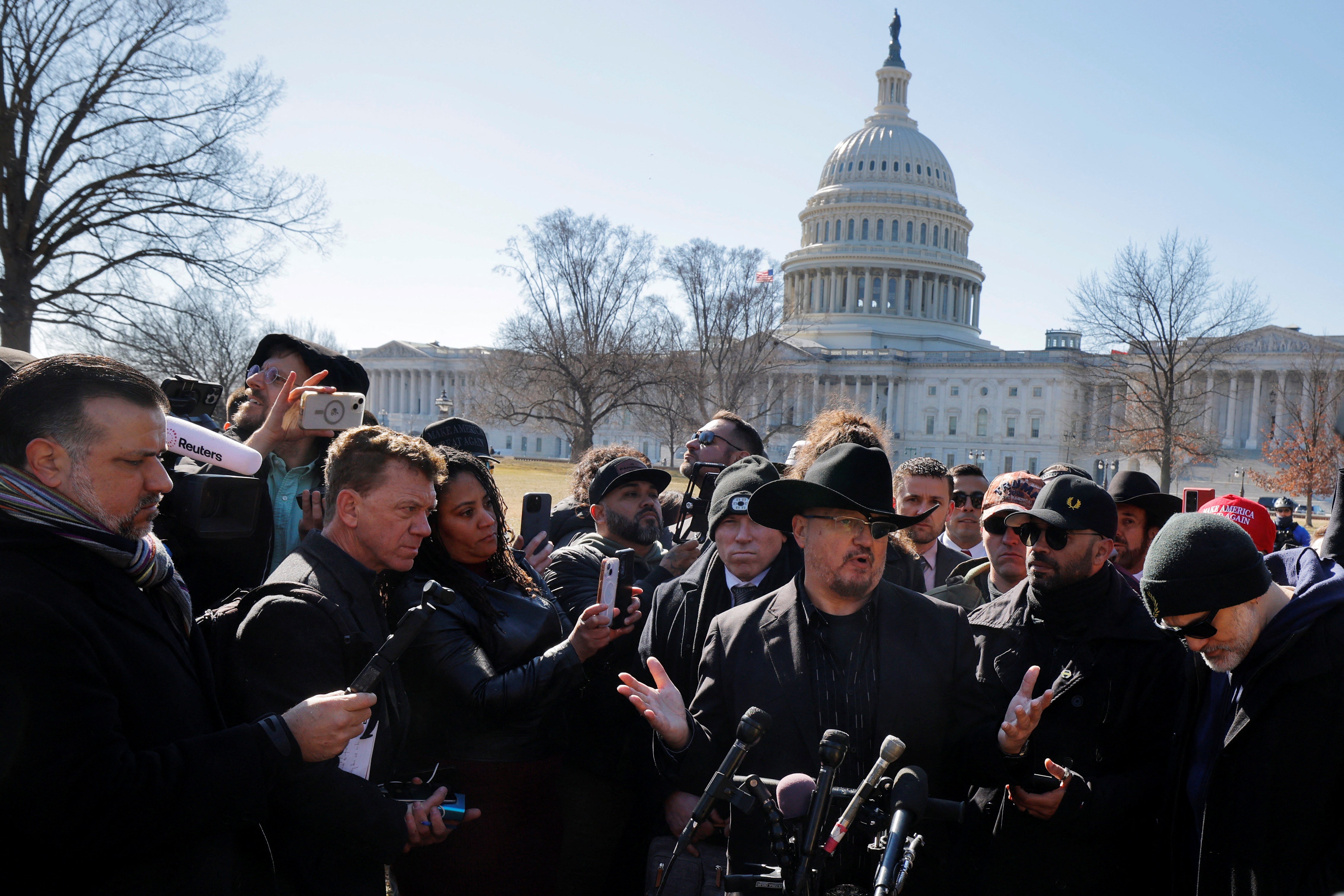 Oath Keepers founder Stewart Rhodes, whose prison sentence for seditious conspiracy in connection with January 6 was commuted by Donald Trump, speaks to reporters in Washington, D.C., on February 21