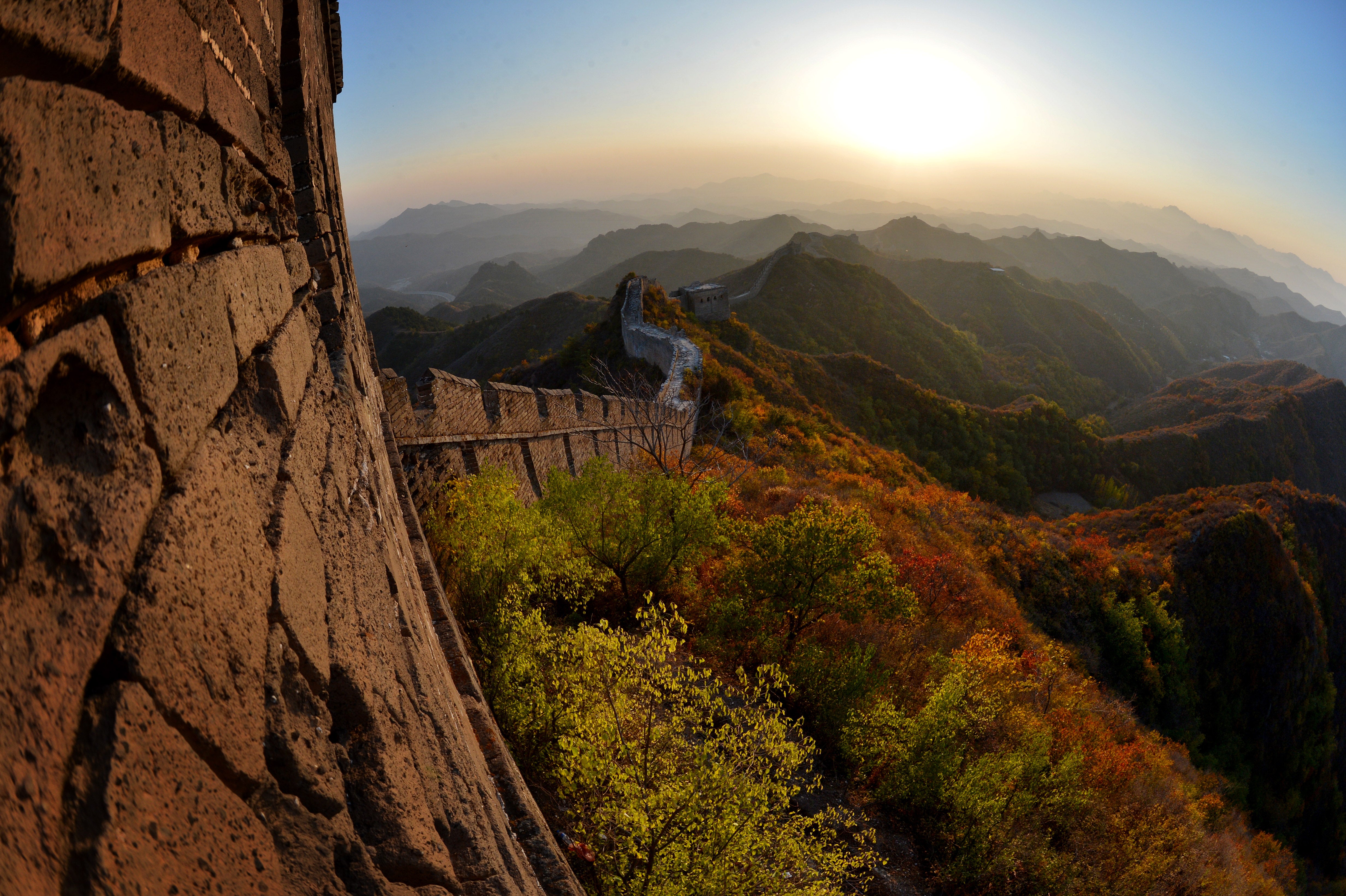 Sun setting over a section of the Great Wall of China at Jinshanling in Hebei