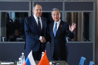 Russian foreign minister Sergei Lavrov attends a meeting with Chinese foreign minister Wang Yi