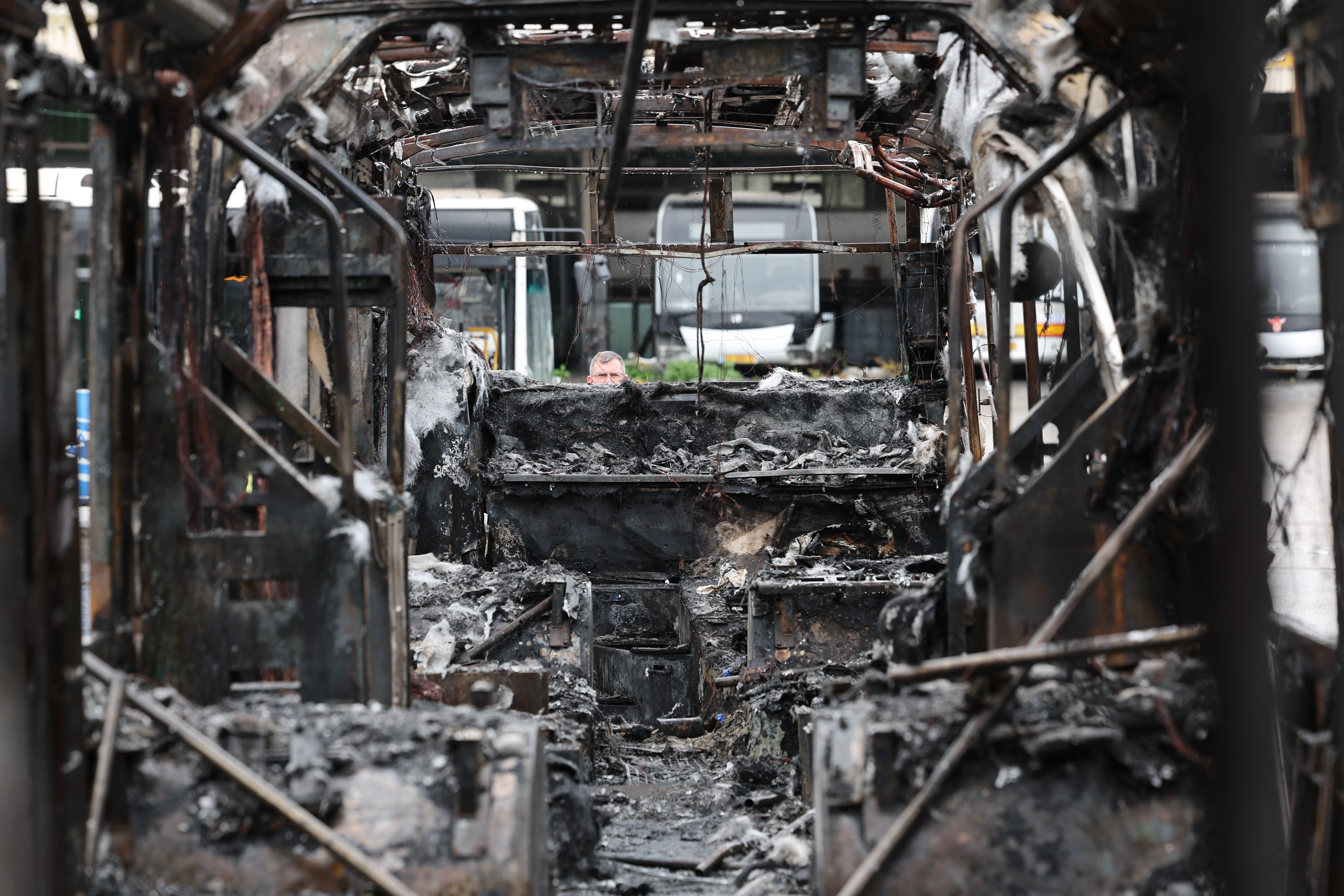 The scorched insides of one of the exploded buses