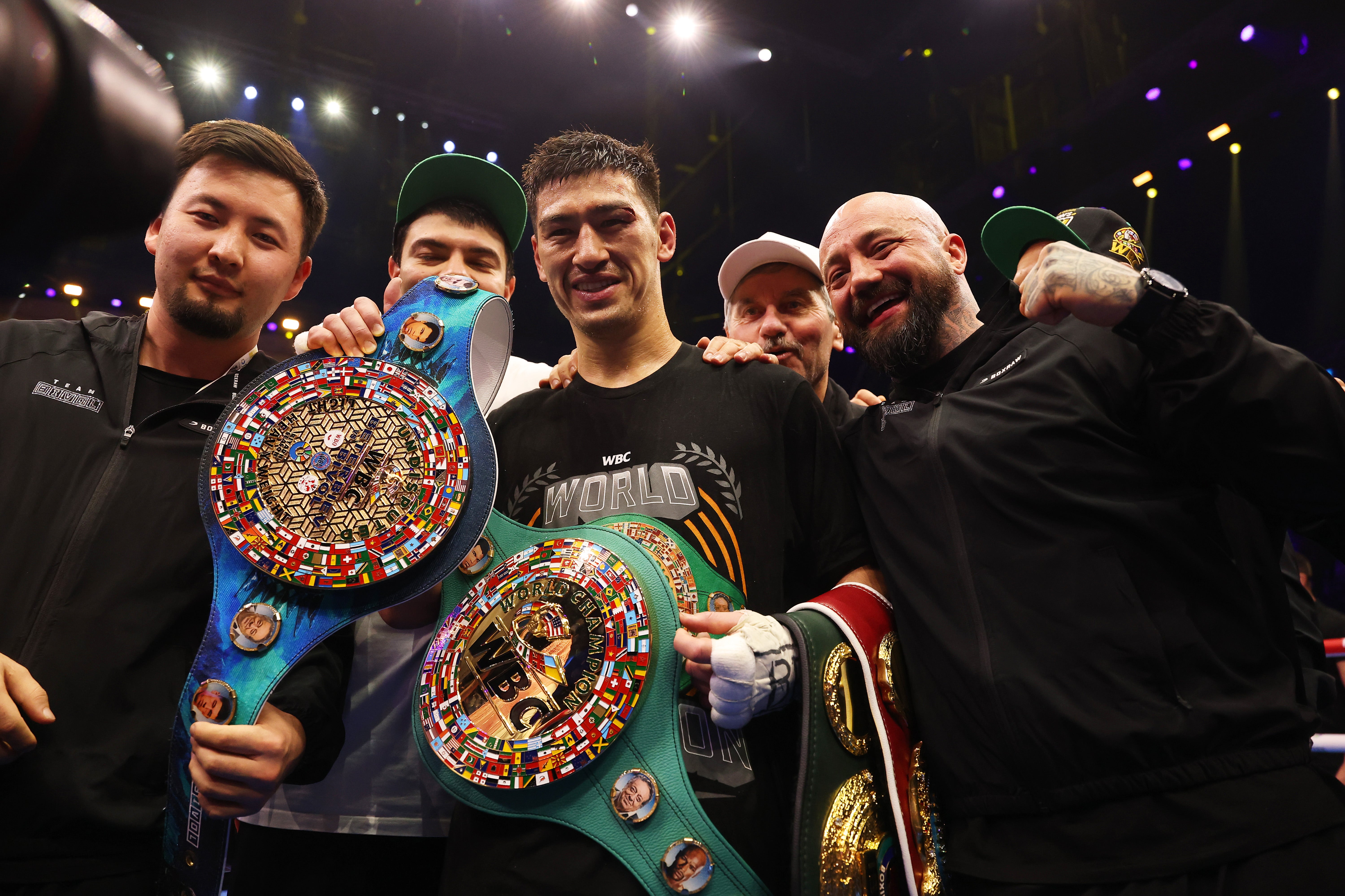 Bivol and his team celebrate their undisputed title win