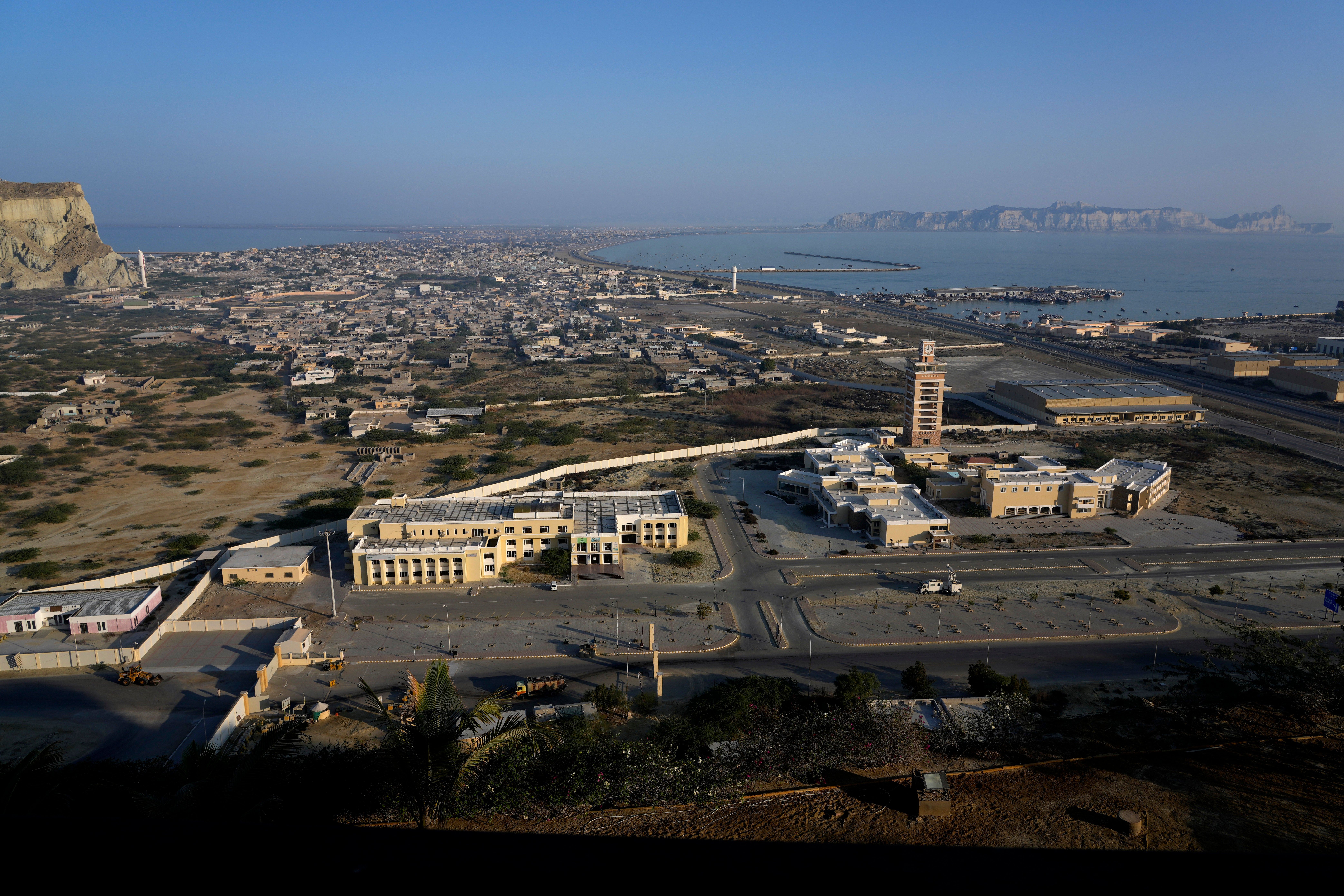 A view of newly developing area, bottom, and downtown area seen from a hilltop in the coastal city of Gwadar, in the southwest Pakistani province of Balochistan, Jan. 14, 2025