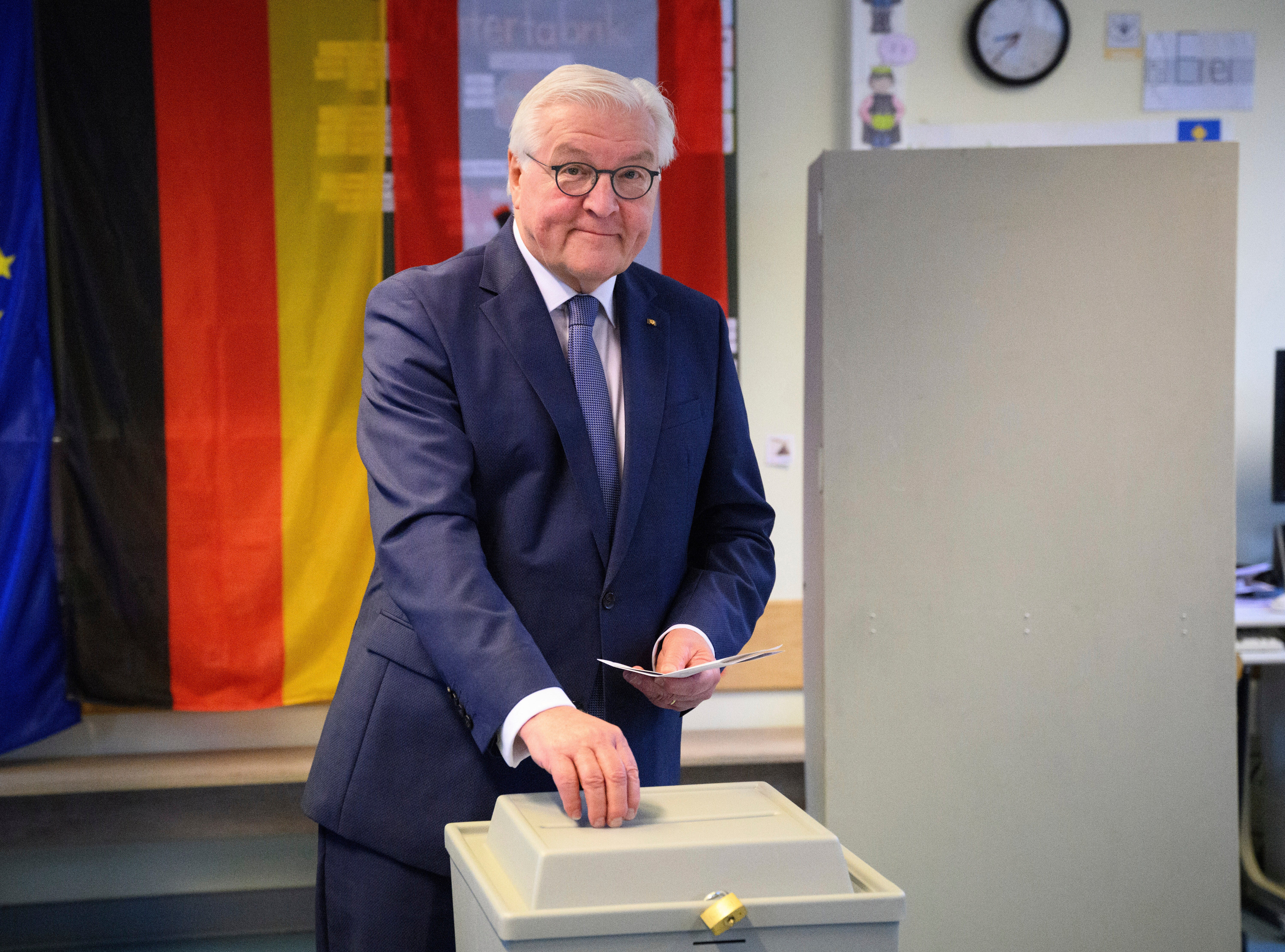 German President Frank-Walter Steinmeier casts his vote at a polling station in Berlin, Germany, during the national election on Sunday