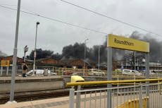 Homes evacuated after major blaze involving lorries on industrial site