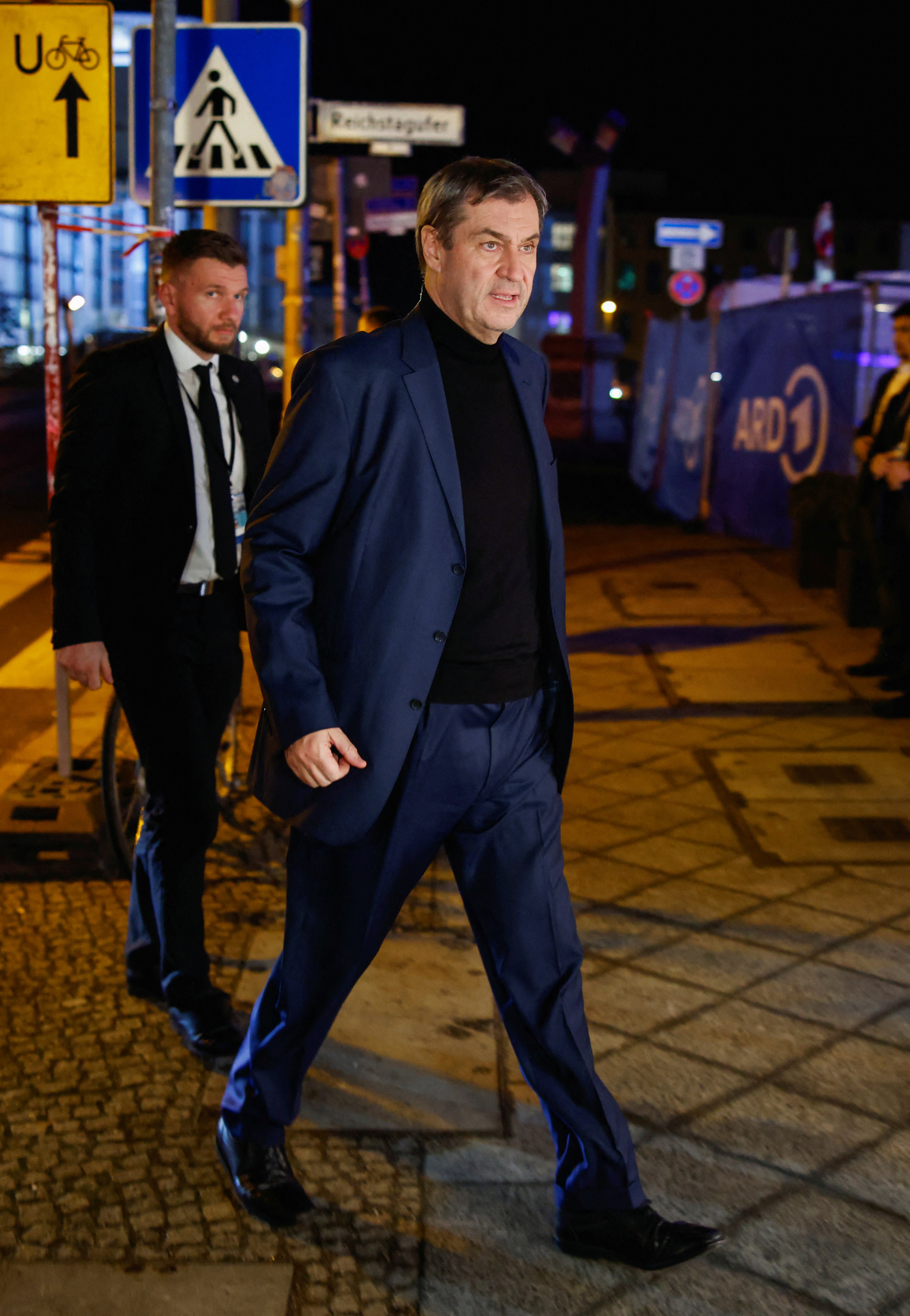 Bavarian state premier and leader of the Christian Social Union (CSU) Markus Soeder arrives before a TV debate following first exit polls in the German general elections in Berlin on Sunday