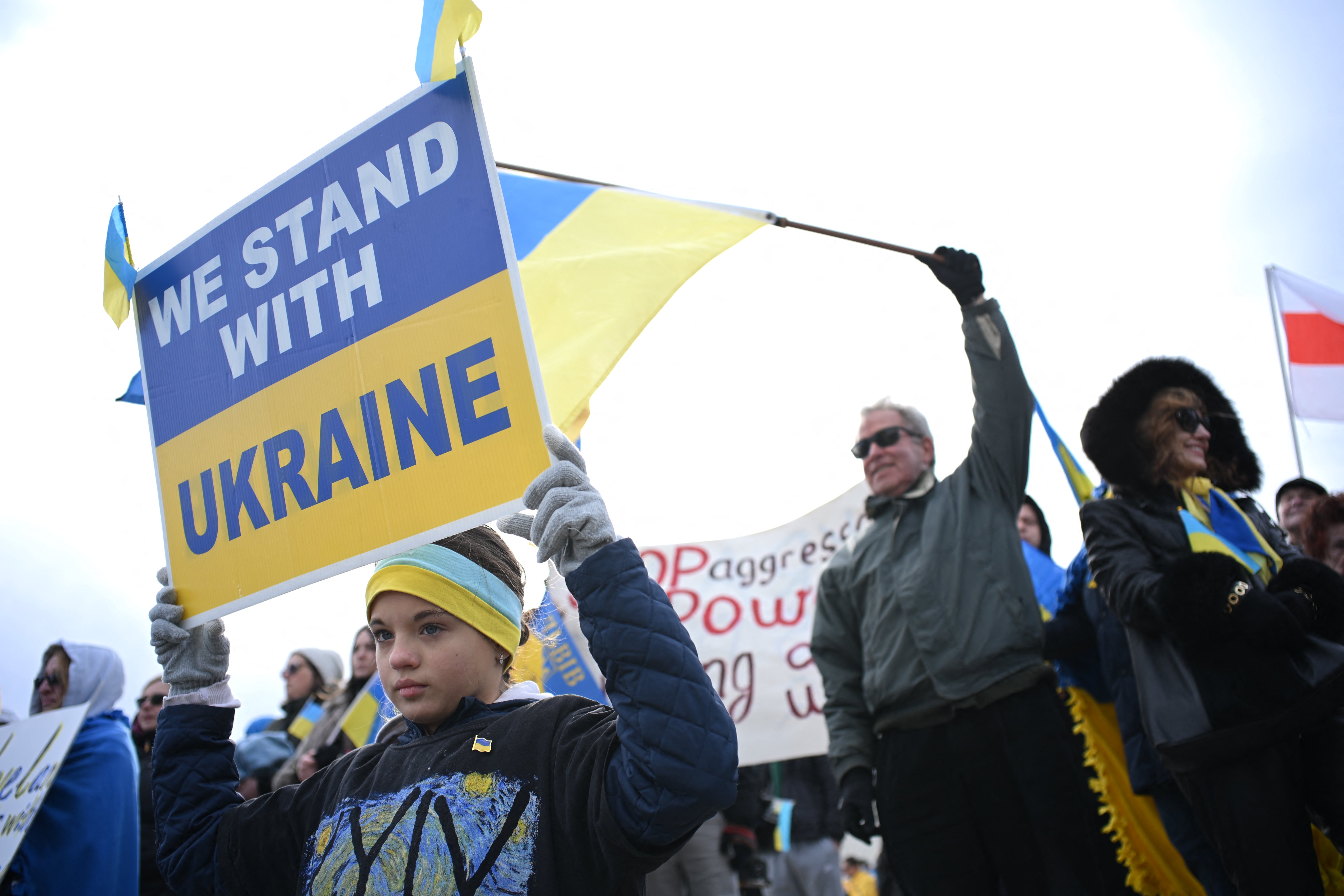 People demonstrate in support of Ukraine ahead of the third anniversary of the war with Russia