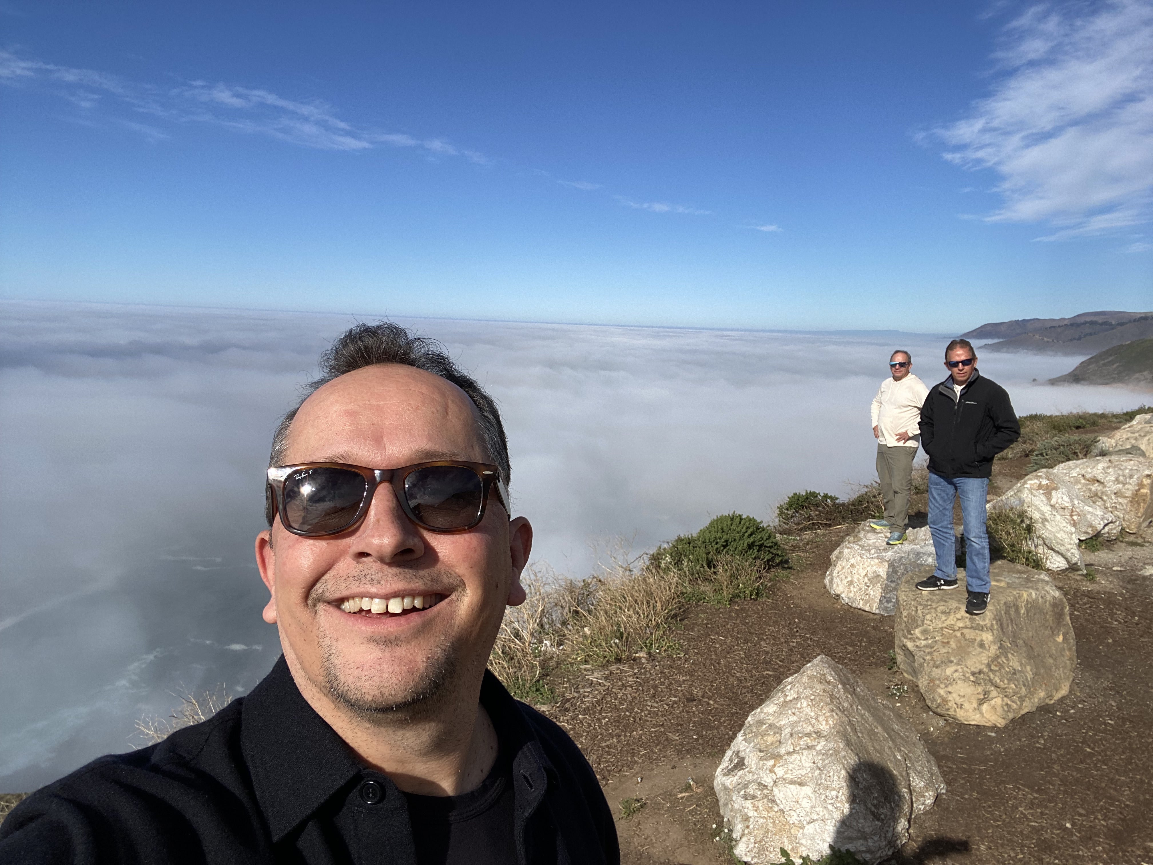 Jason, pictured left, with his brothers on holiday in California