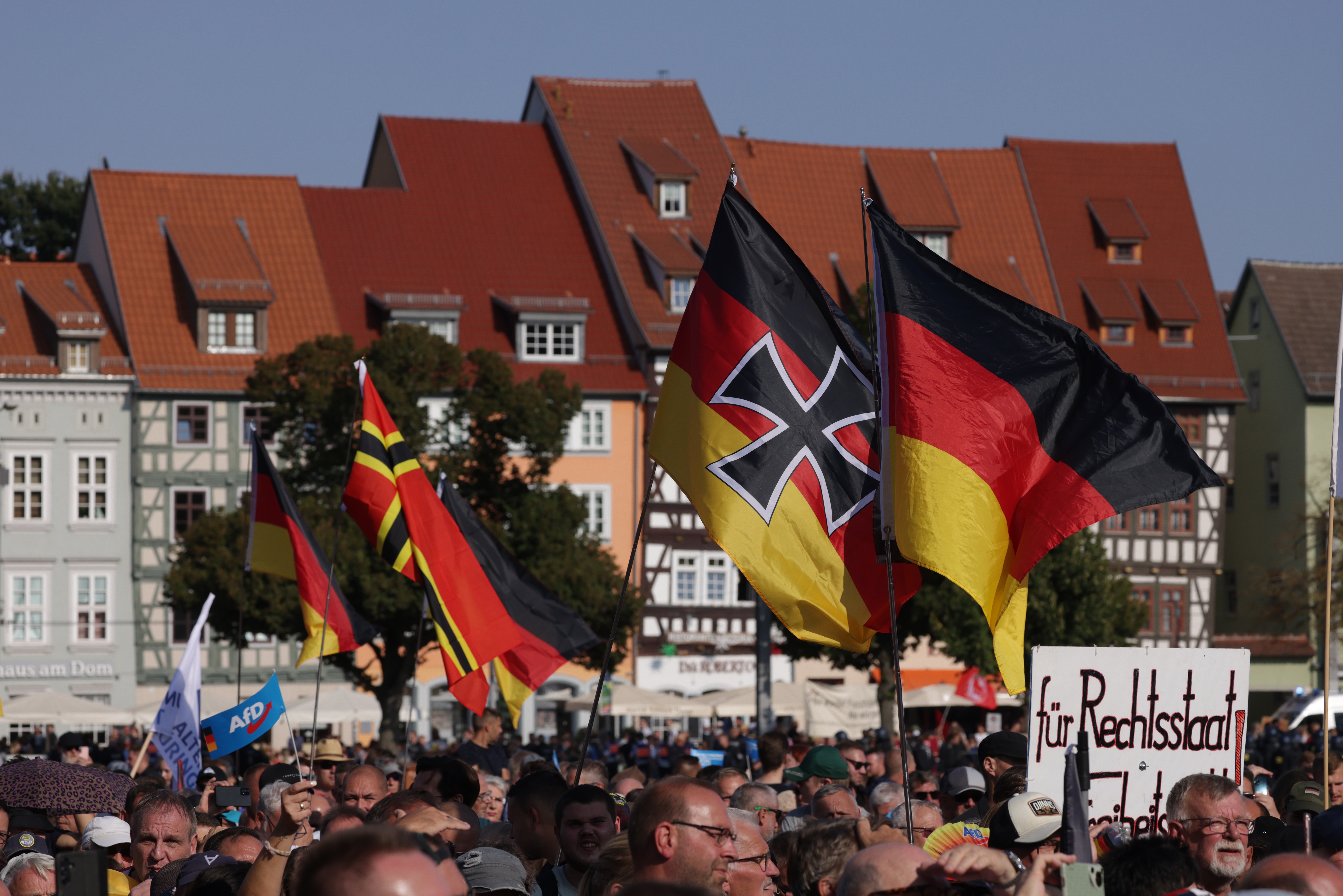 AfD supporters waved German flags, including one adorned with an Iron Cross, at the final AfD campaign rally ahead of Thuringia state elections in August 2024