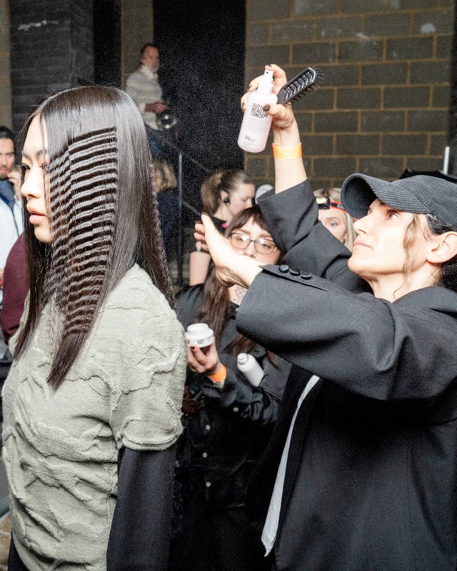 <p>The crimping was presented alongside glossy pin-straight hair</p>