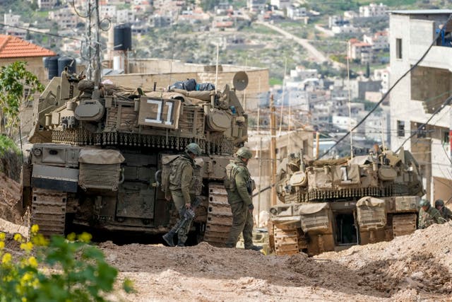 <p>Israeli Merkava tanks in Jenin on Monday</p>