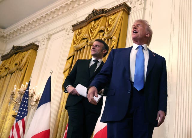 <p>Donald Trump and French President Emmanuel Macron leave a joint press conference in the East Room at the White House</p>