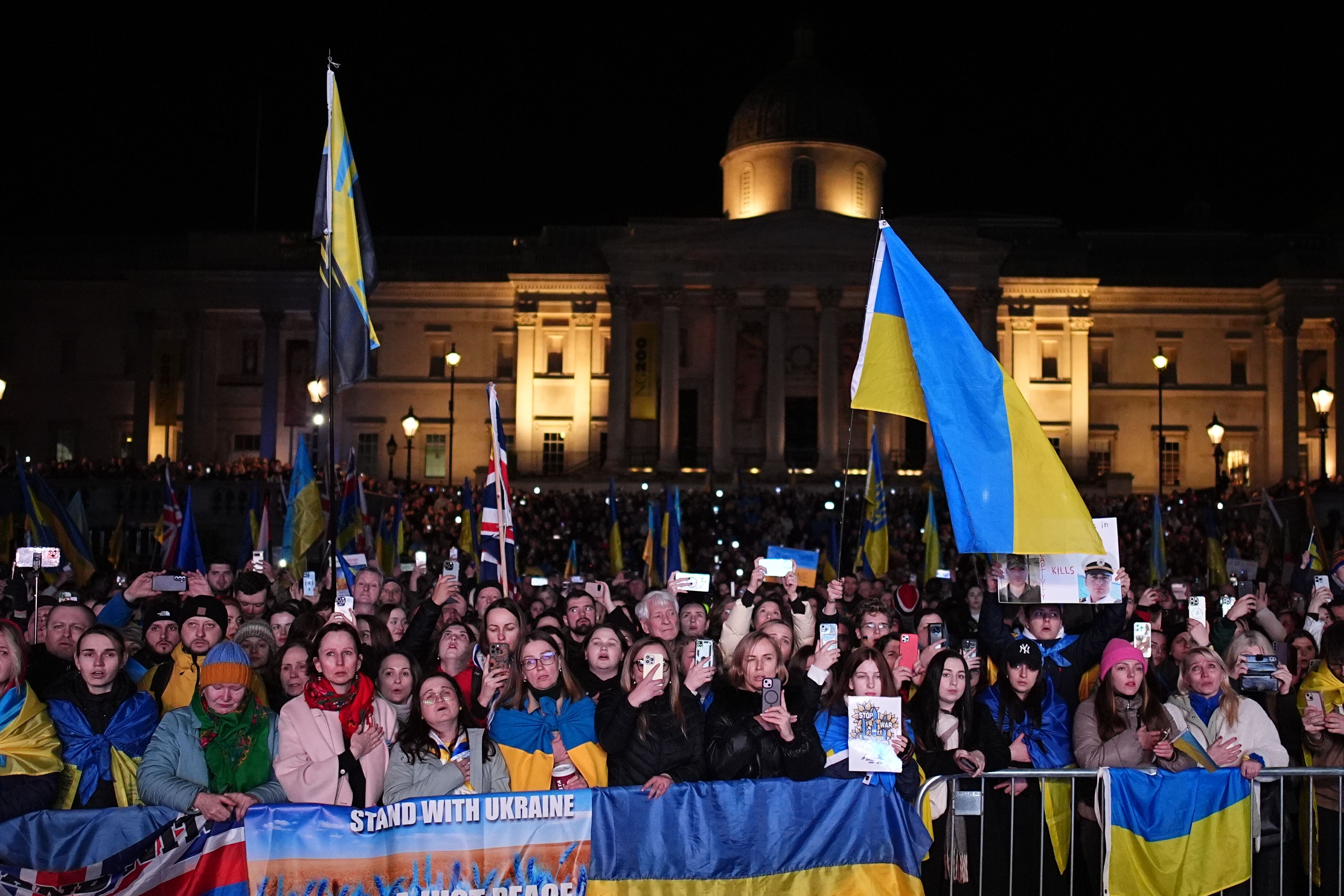 People gather in Trafalgar Square, central London (Aaron Chown/PA)