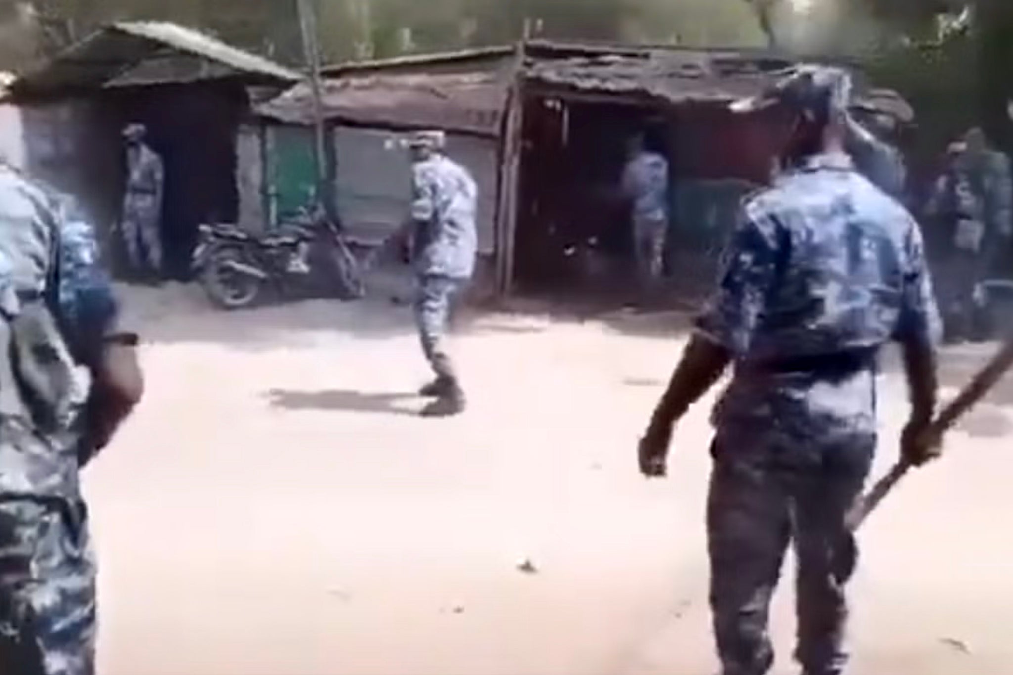 <p>Still from a video shows the Bangladesh armed forces in action during violence on Monday<em> </em></p>