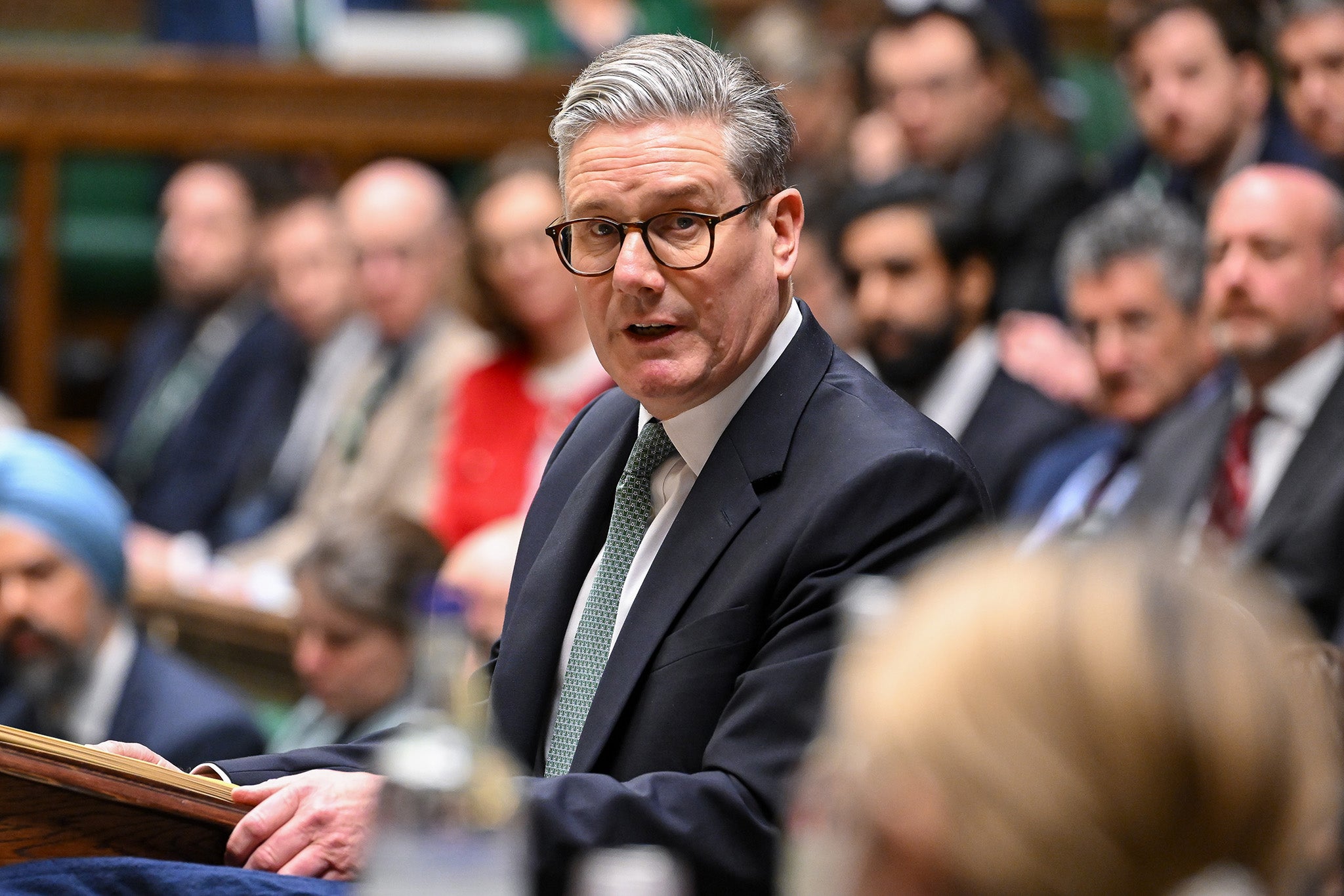 <p>Starmer announcing a drastic increase in military spending in the House of Commons</p>