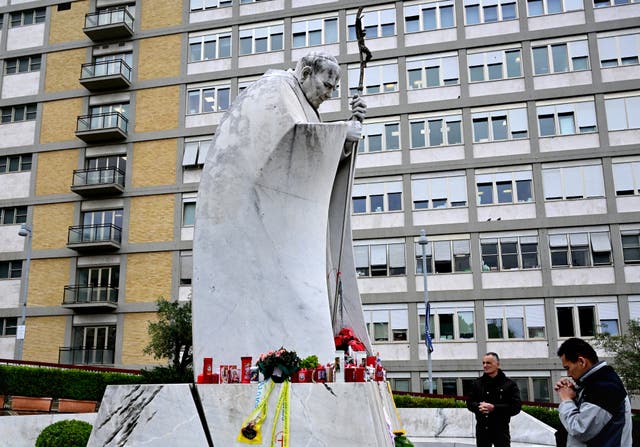 <p>Well-wishers pray outside the Gemelli hospital in Rome where Pope Francis remains in a critical condition </p>