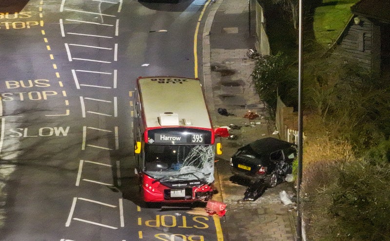 Woman killed and two injured after crash between London bus and car